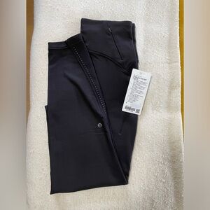 NWT lululemon chase the chill high rise pant. Black. Size 6.